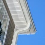 Gutter attaching to roofline