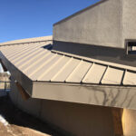 commercial roofing of slanted building
