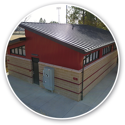building with finished roof and gutters