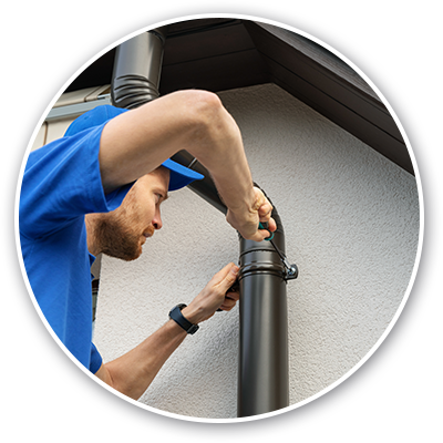man working on gutter